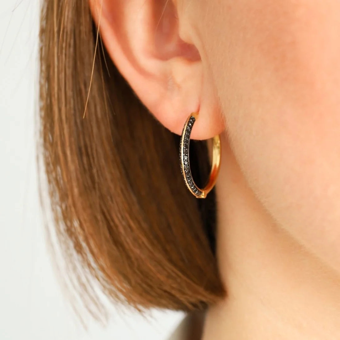 Sareena Black Diamond Hoops in Yellow Gold