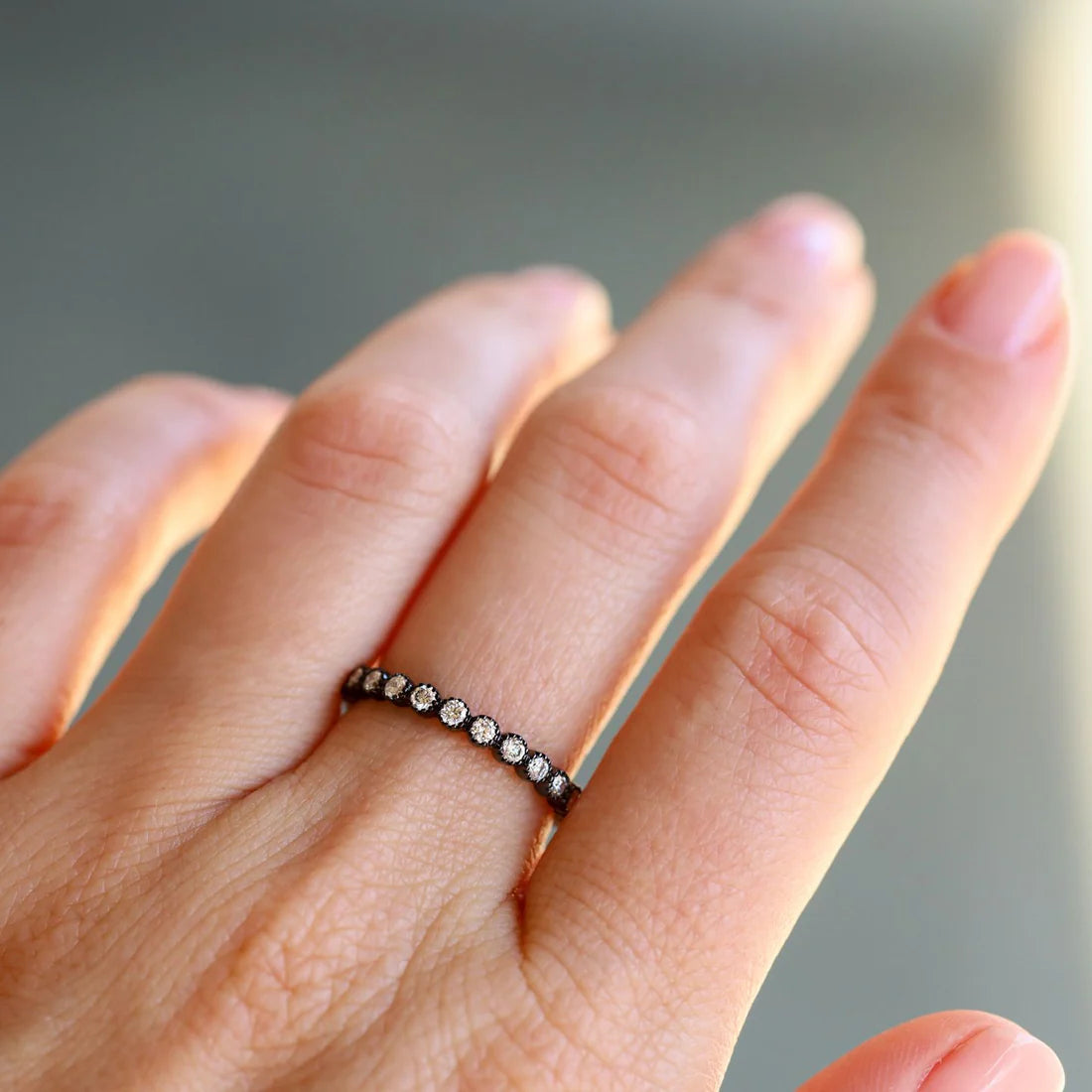 Bezel White Diamond Band in Blackened Gold