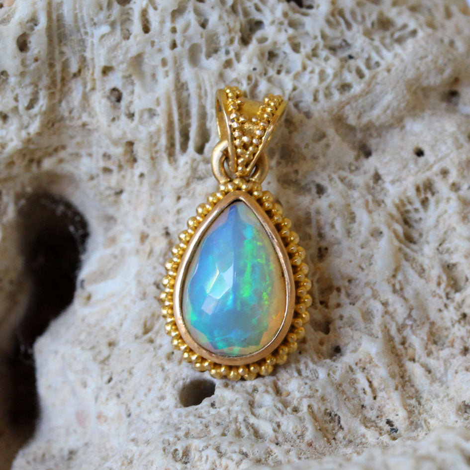 Faceted Ethiopian Opal Pendant in Yellow Gold