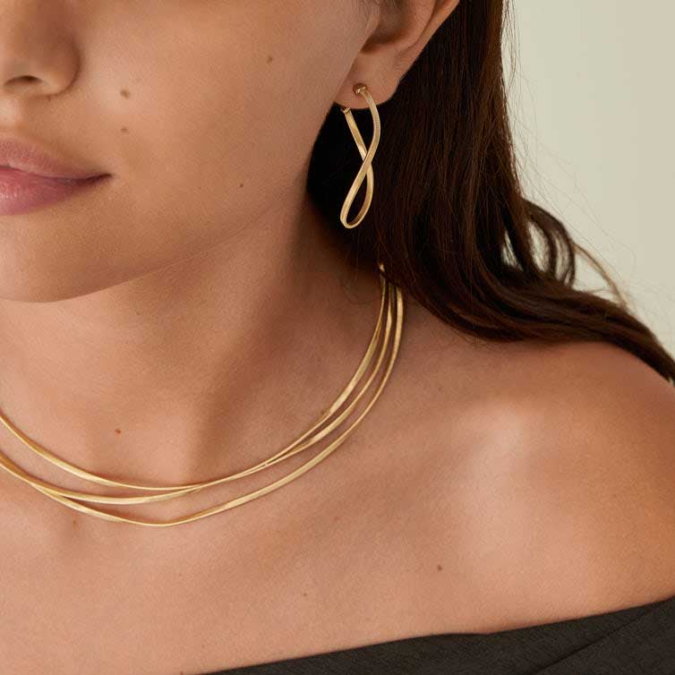 Marrakech Medium Twisted Infinity Hoops in Yellow Gold