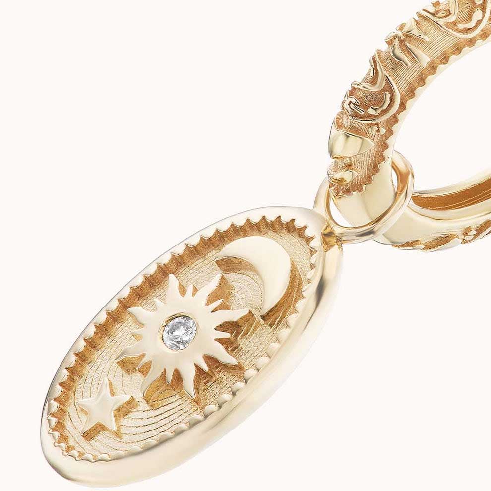 Oval Southwestern Huggies in Yellow Gold