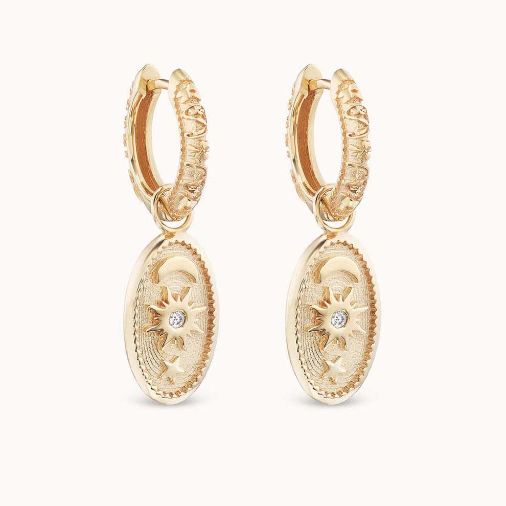 Oval Southwestern Huggies in Yellow Gold