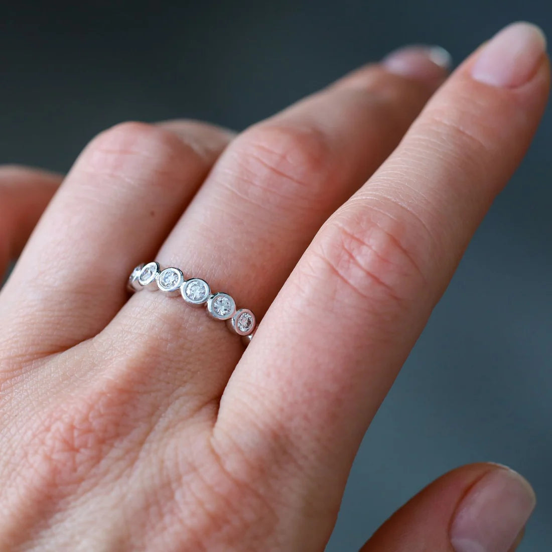 Modern Bezel Diamond Band in Yellow Gold