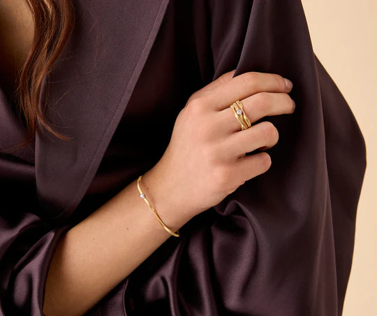 Marrakech Coil Diamond Bangle in Yellow Gold and White Gold