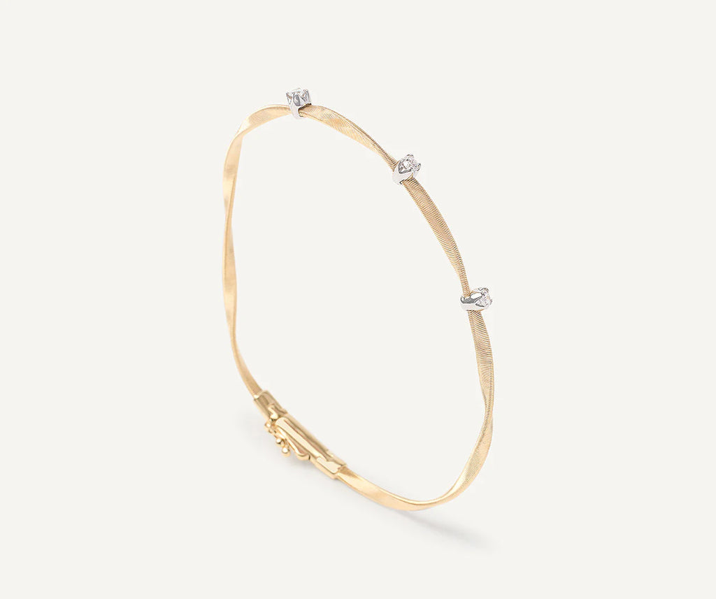 Marrakech Diamond Station Coil Bangle in Yellow Gold