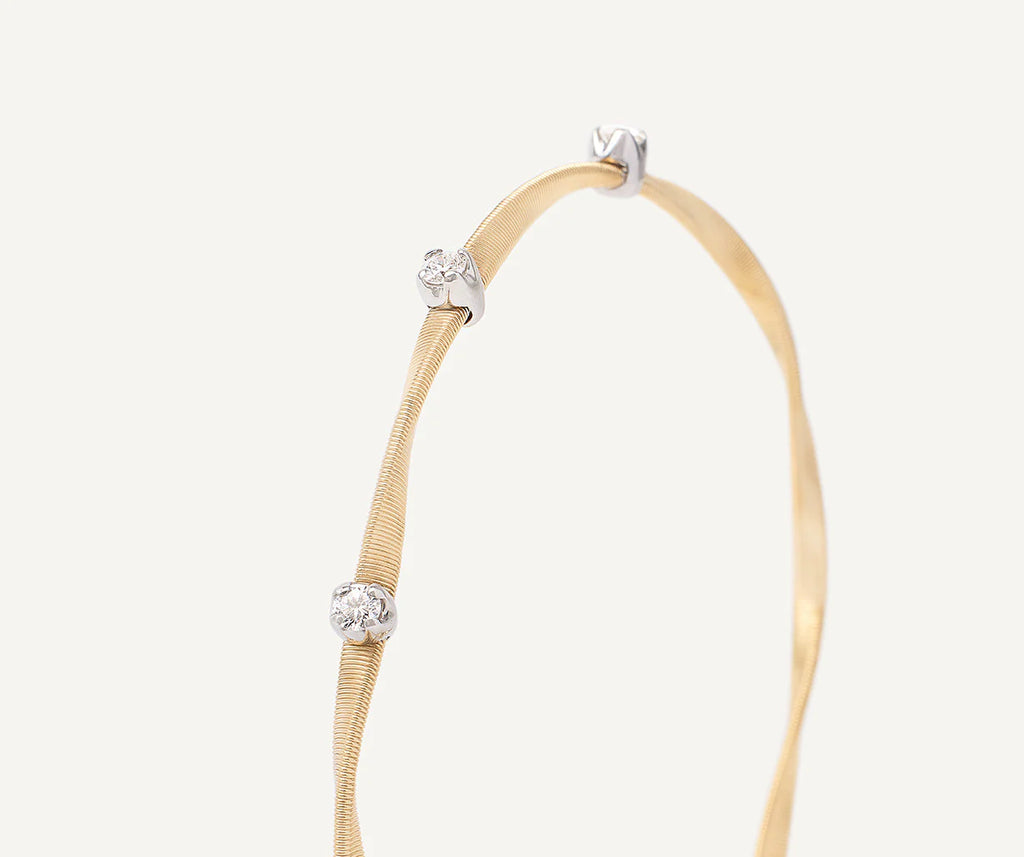 Marrakech Diamond Station Coil Bangle in Yellow Gold