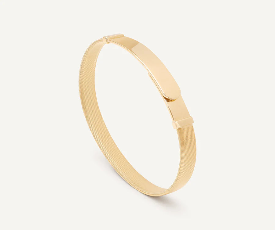 Masai Coil Bangle Bracelet in Yellow Gold