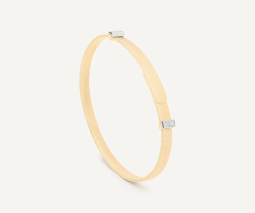 Masai Coil Diamond Pavé Bangle in Yellow Gold