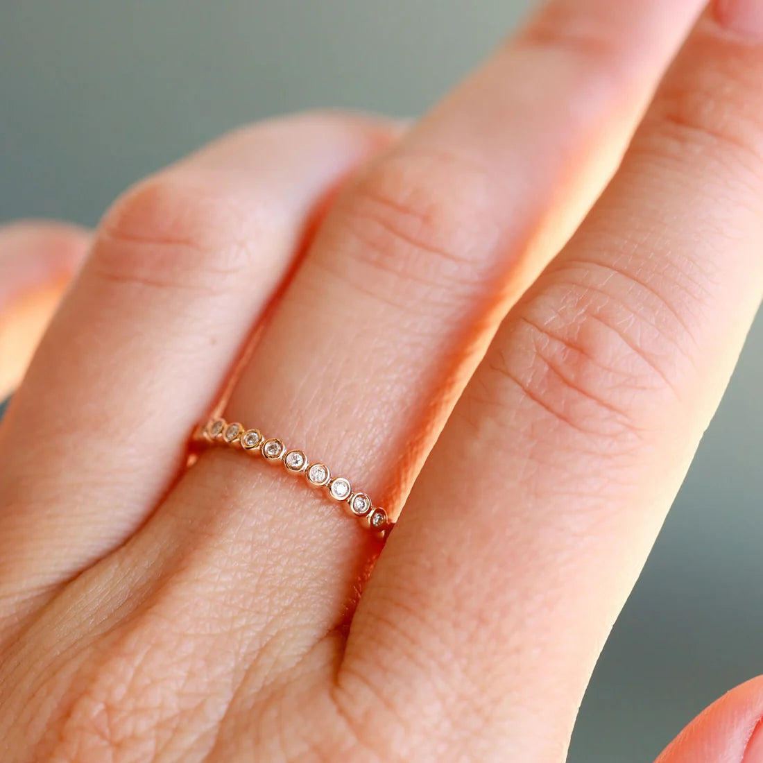 Mini Bezel White Diamond Band in Yellow Gold