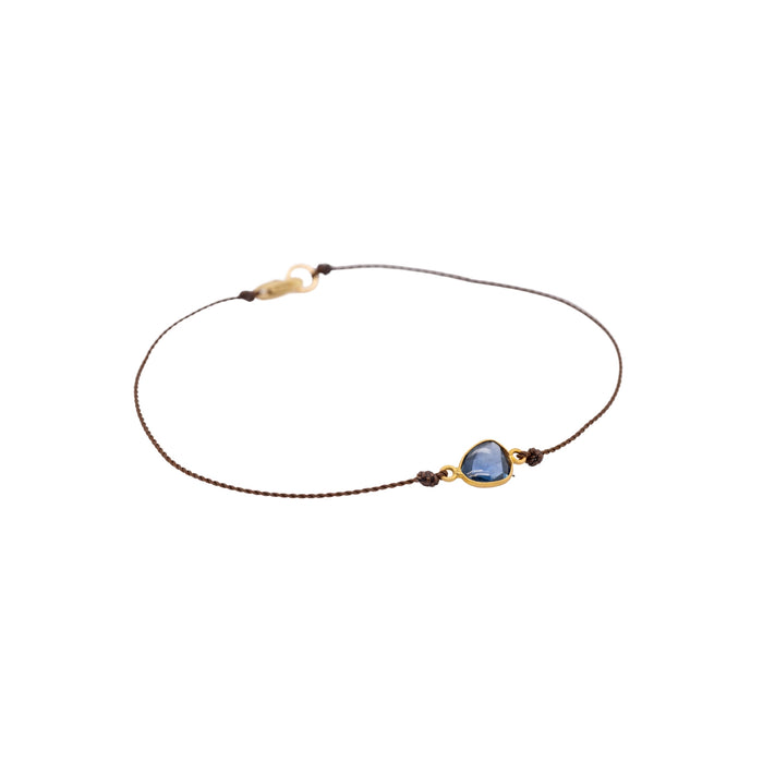 Blue Sapphire with Yellow Gold Bezel on Silk Bracelet