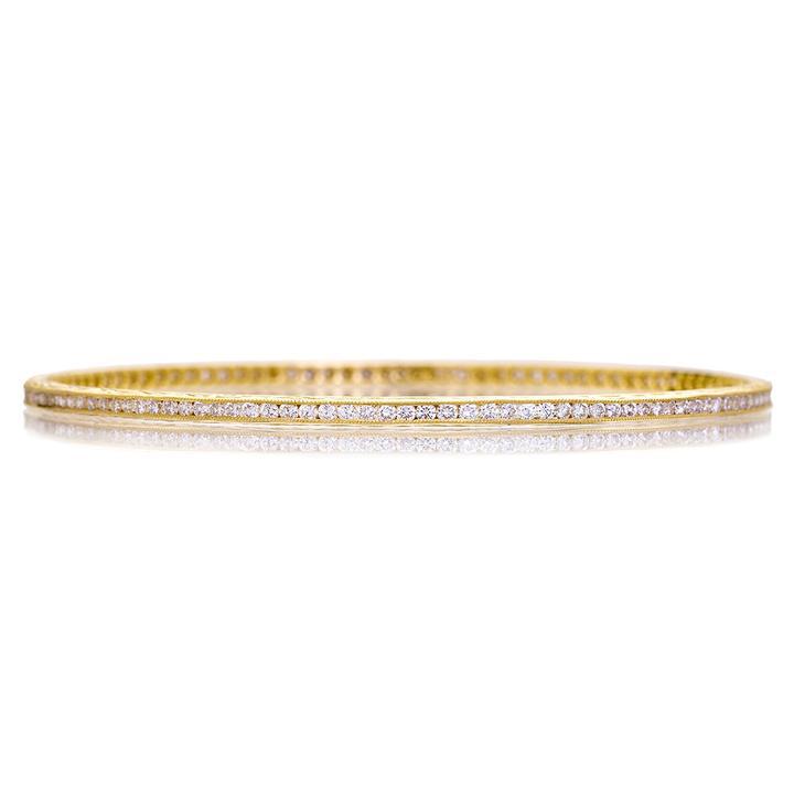 Channel White Diamond Bangle in Yellow Gold